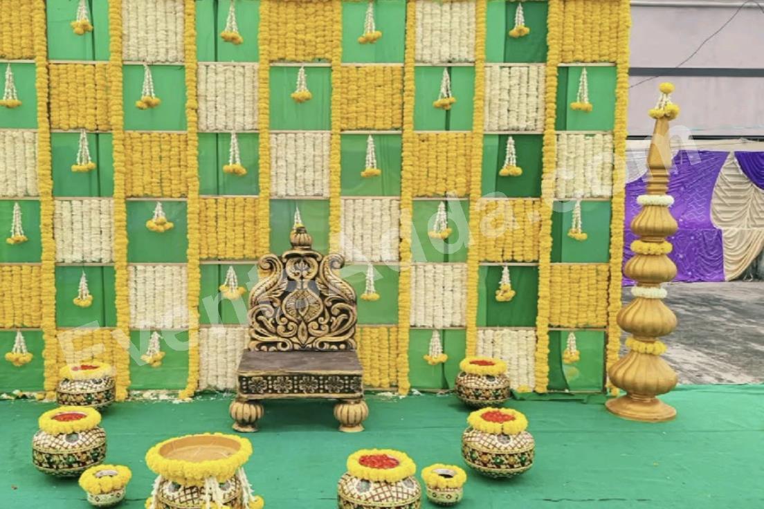 royal-green-and-yellow-marigold-haldi-decoration-4.jpg