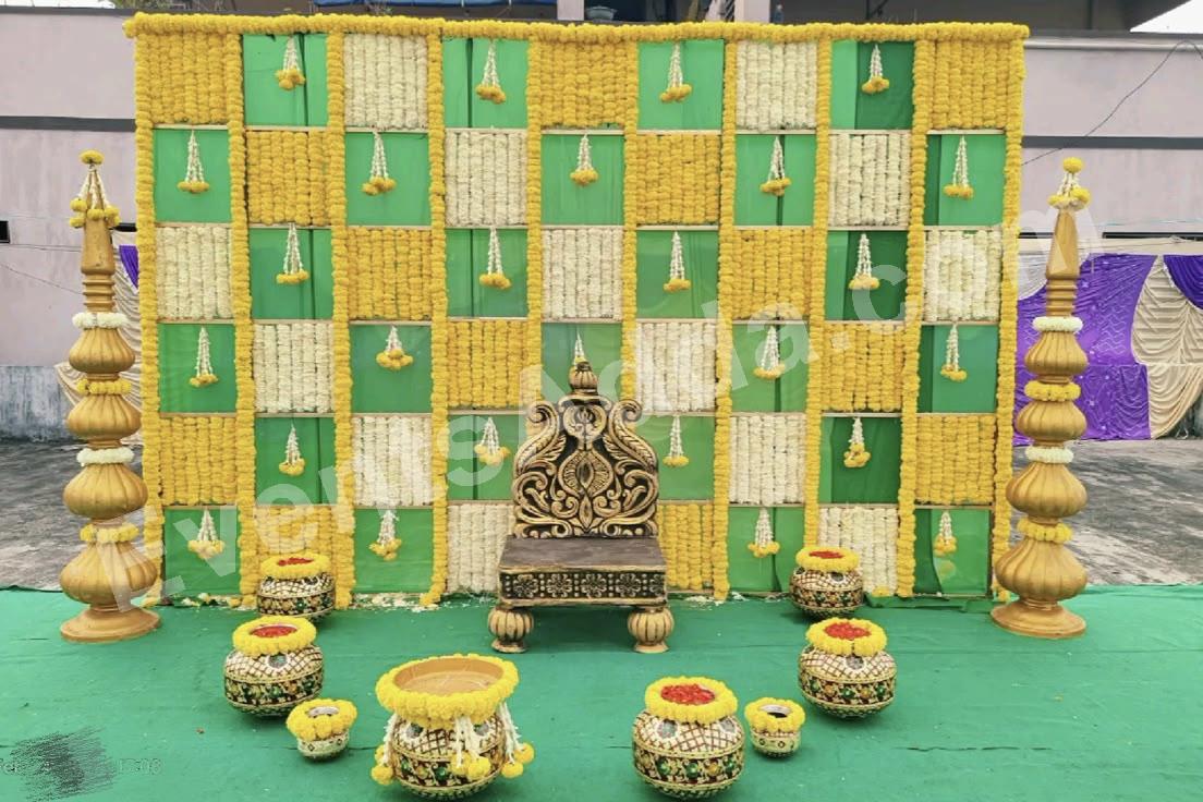 royal-green-and-yellow-marigold-haldi-decoration in Ahmedabad
