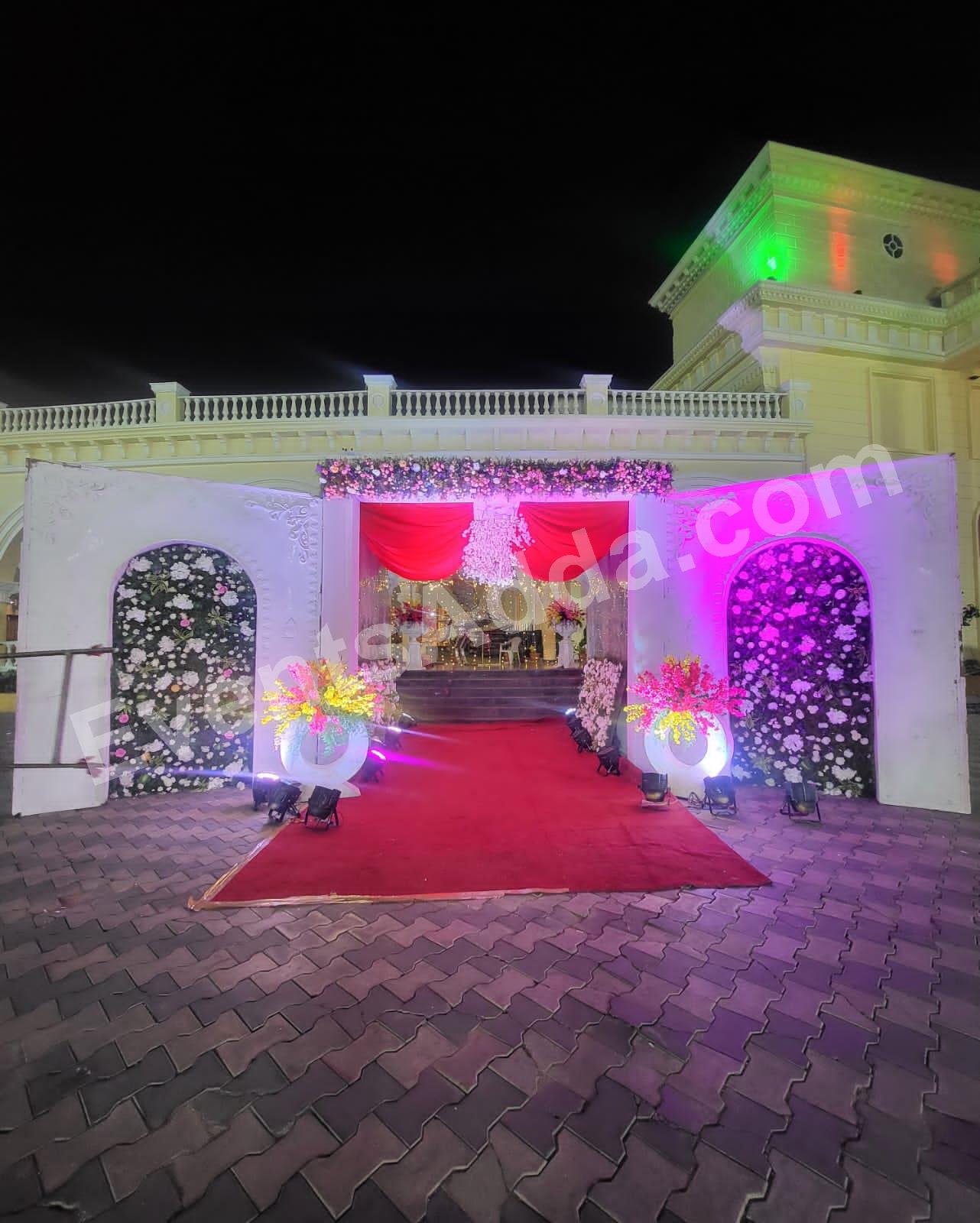royal-red-draped-floral-entrance-decoration in Bangalore