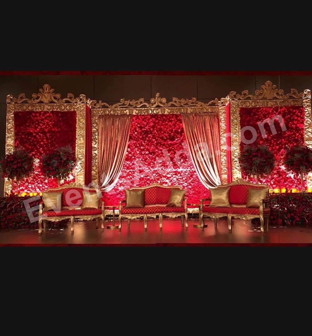 royal-red-floral-reception-stage-decoration-. in Bangalore