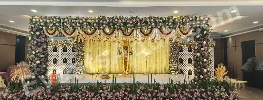 royal-temple-theme-floral-wedding-stage-decoration in Peddapalli