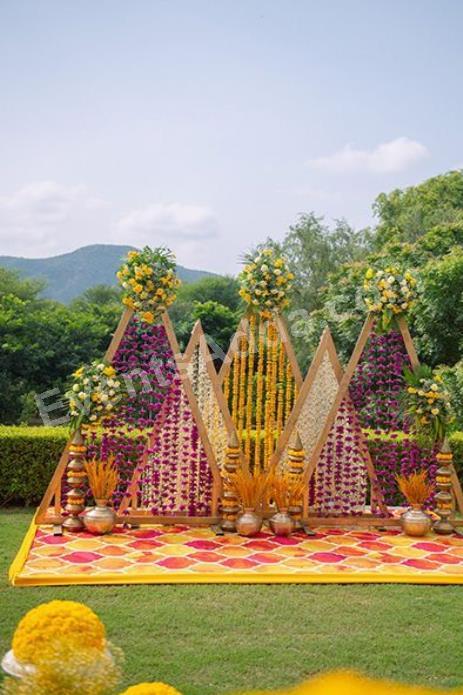 royal-triangle-floral-haldi-backdrop-decoration-3.jpg