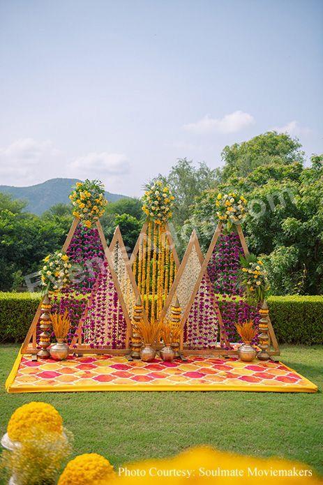 royal-triangle-floral-haldi-backdrop-decoration Decoration in =Hyderabad