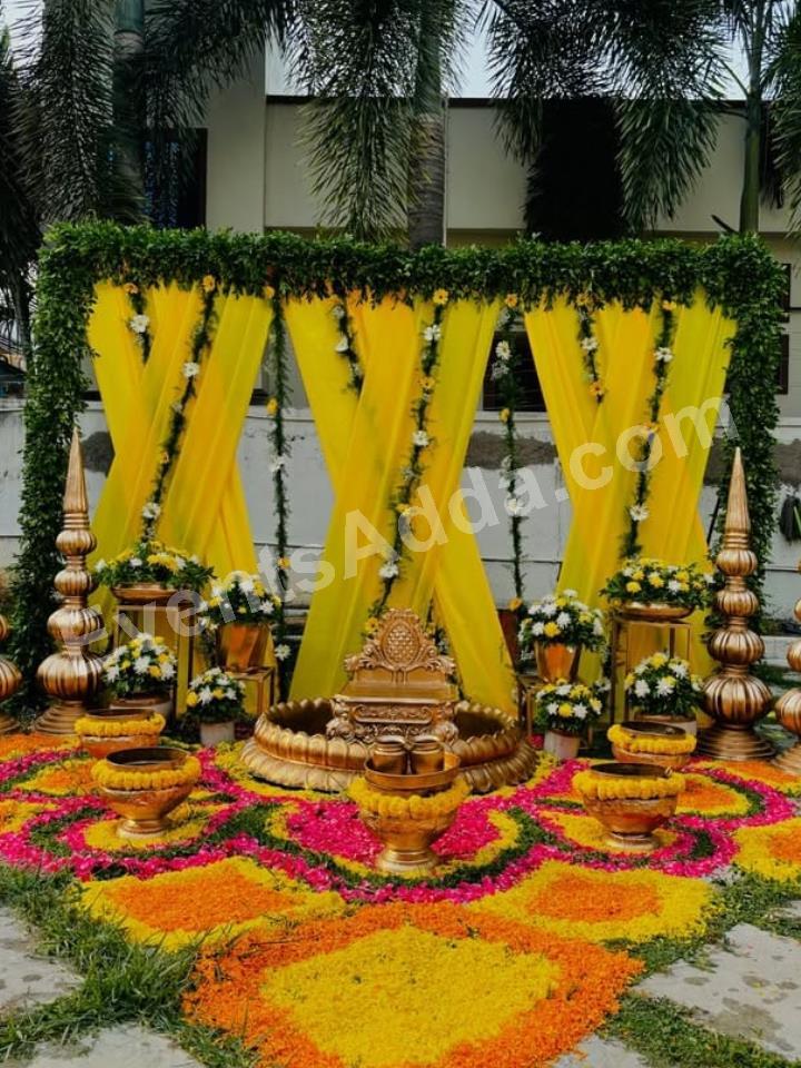 royal-yellow-draped-haldi-ceremony-decoration-2.jpg