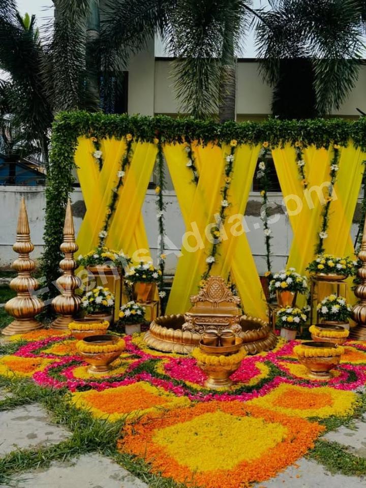 royal-yellow-draped-haldi-ceremony-decoration-3.jpg