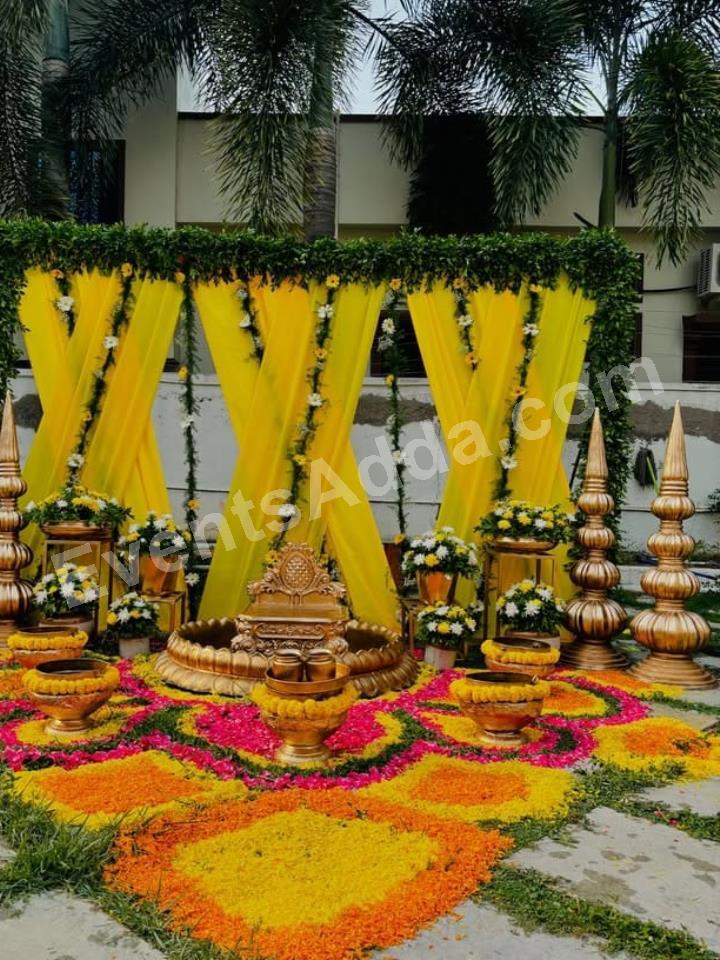 royal-yellow-draped-haldi-ceremony-decoration-4.jpg