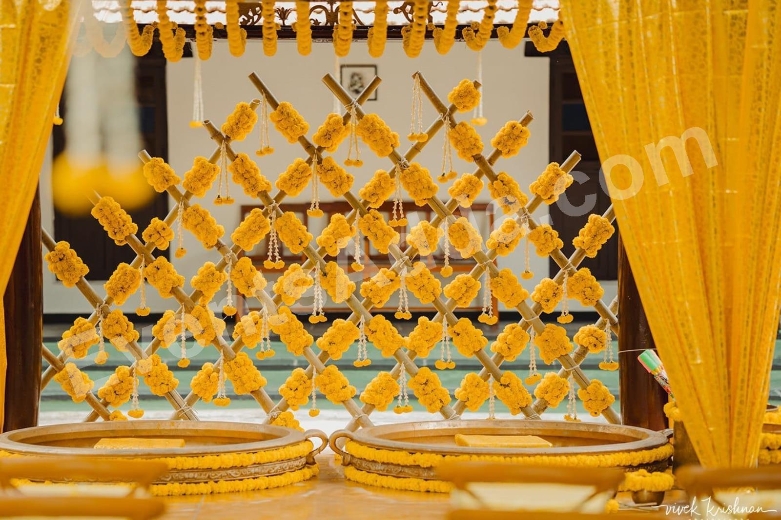 rustic-marigold-haldi-ceremony-bamboo-backdrop-decoration-4.jpg