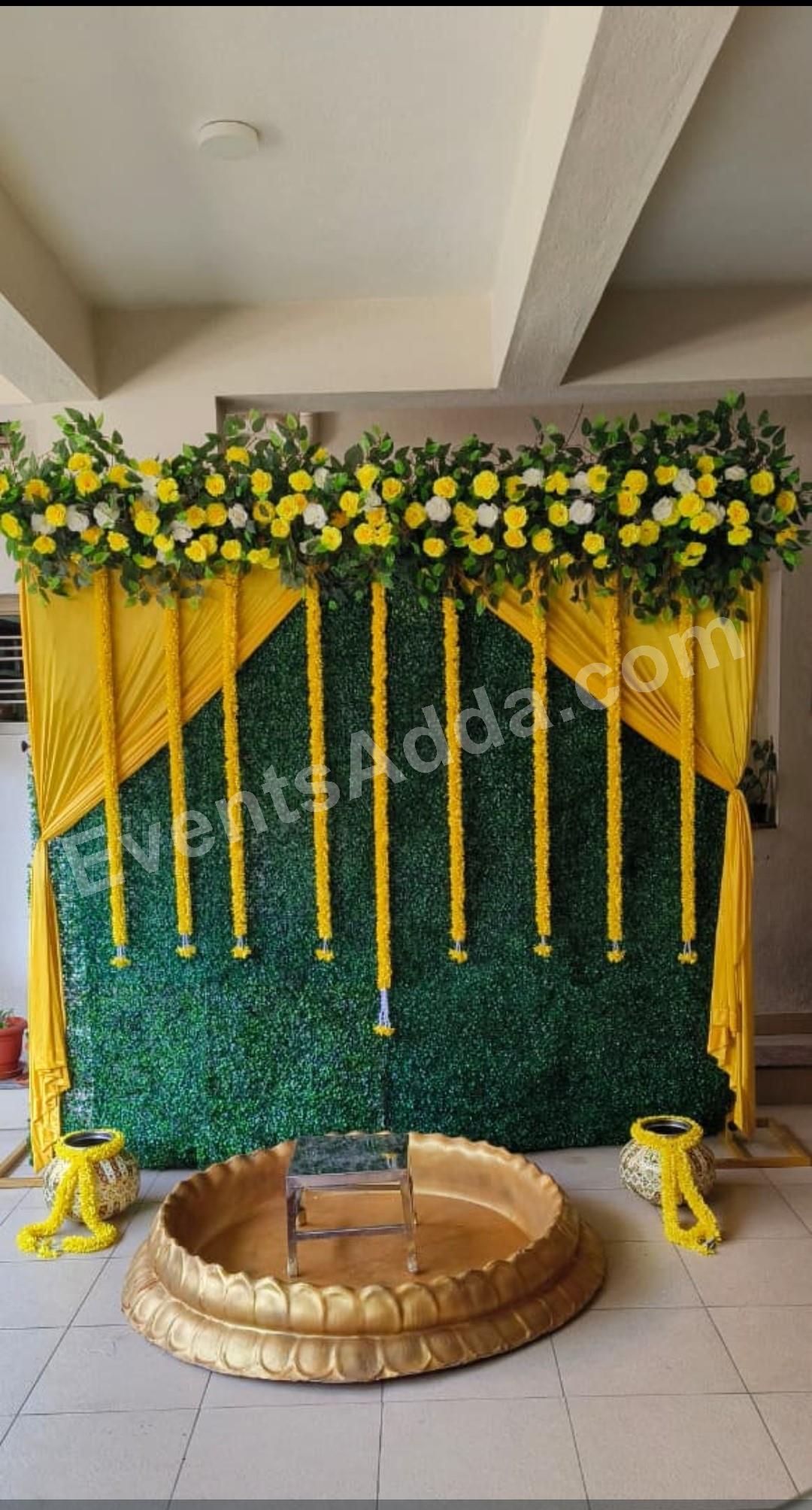 simple-green-and-yellow-floral-haldi-decoration in Ahmedabad