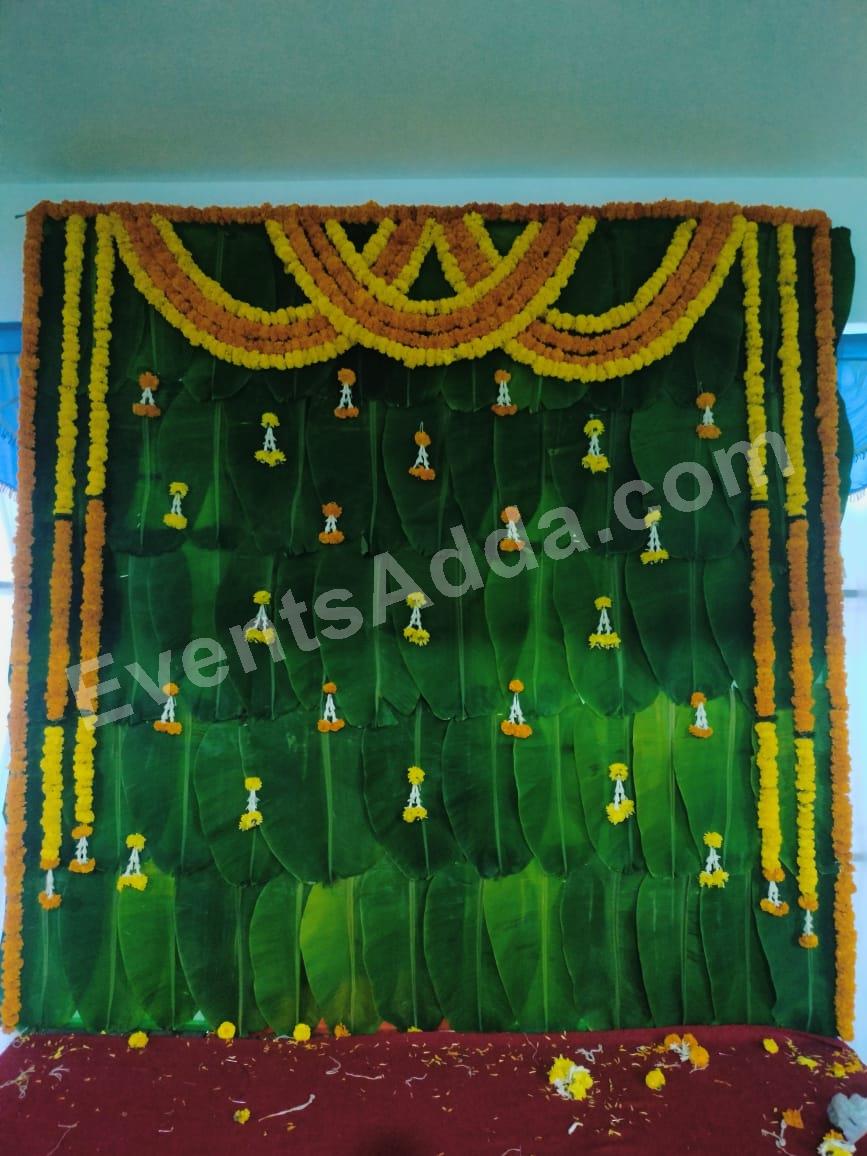 Traditional Banana Leaf & Marigold Floral Backdrop Decoration Decoration in Ahmedabad