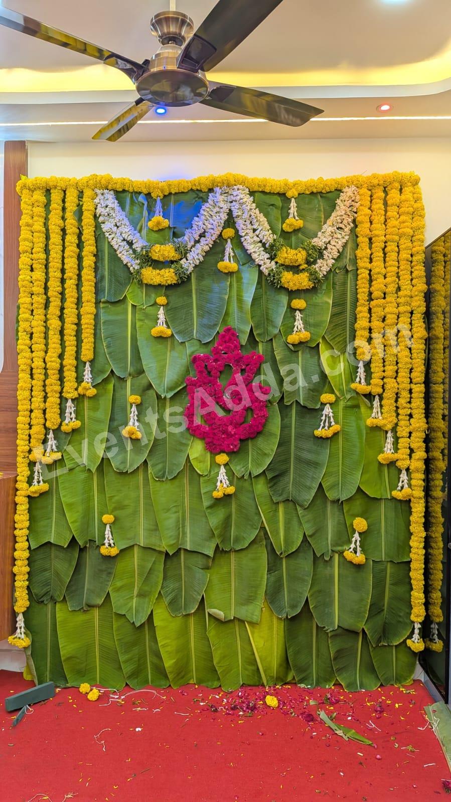 traditional-banana-leaf-haldi-backdrop-with-floral-ganesha-decoration Decoration in =Dubai