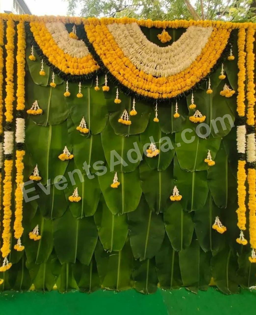 traditional-banana-leaf-marigold-floral-backdrop-decoration-2.jpg