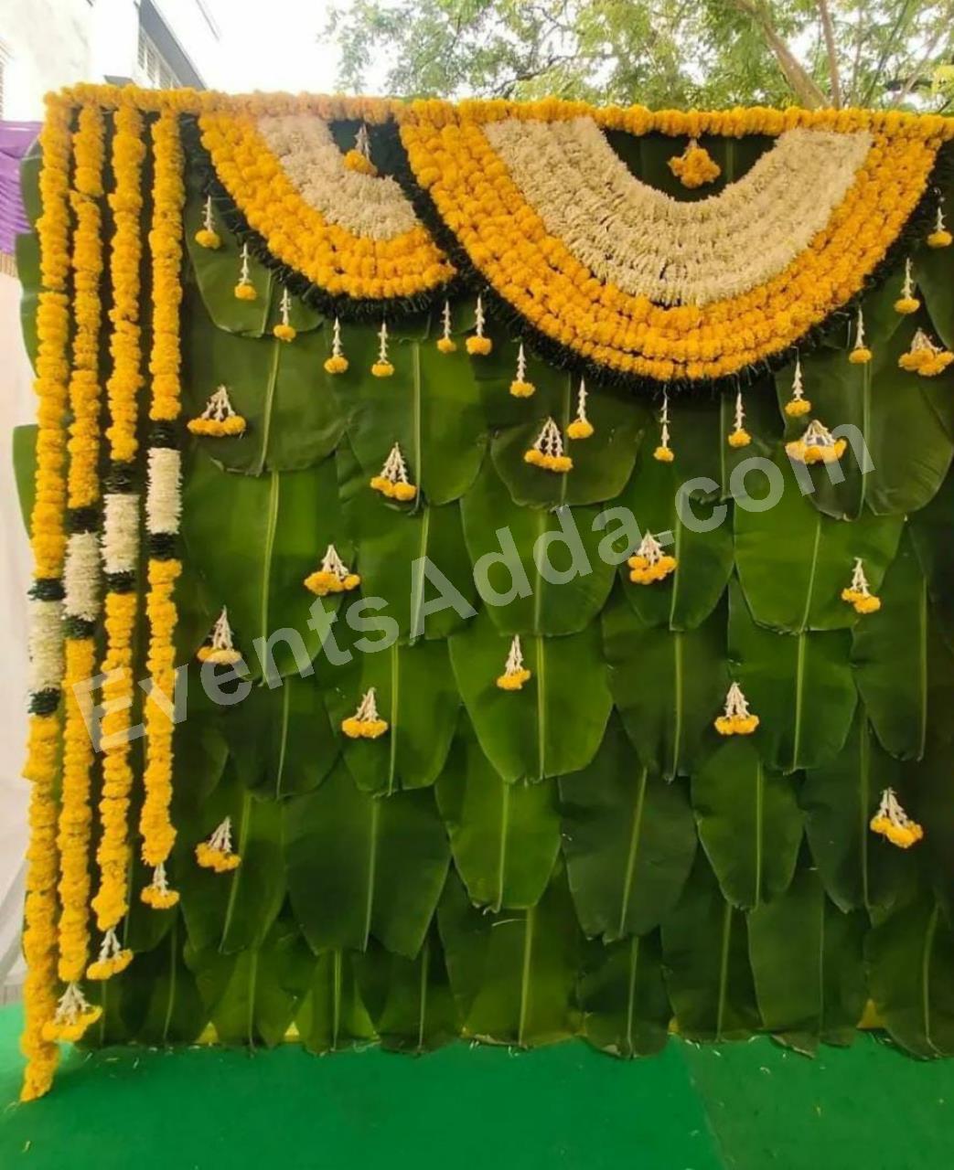 traditional-banana-leaf-marigold-floral-backdrop-decoration-3.jpg