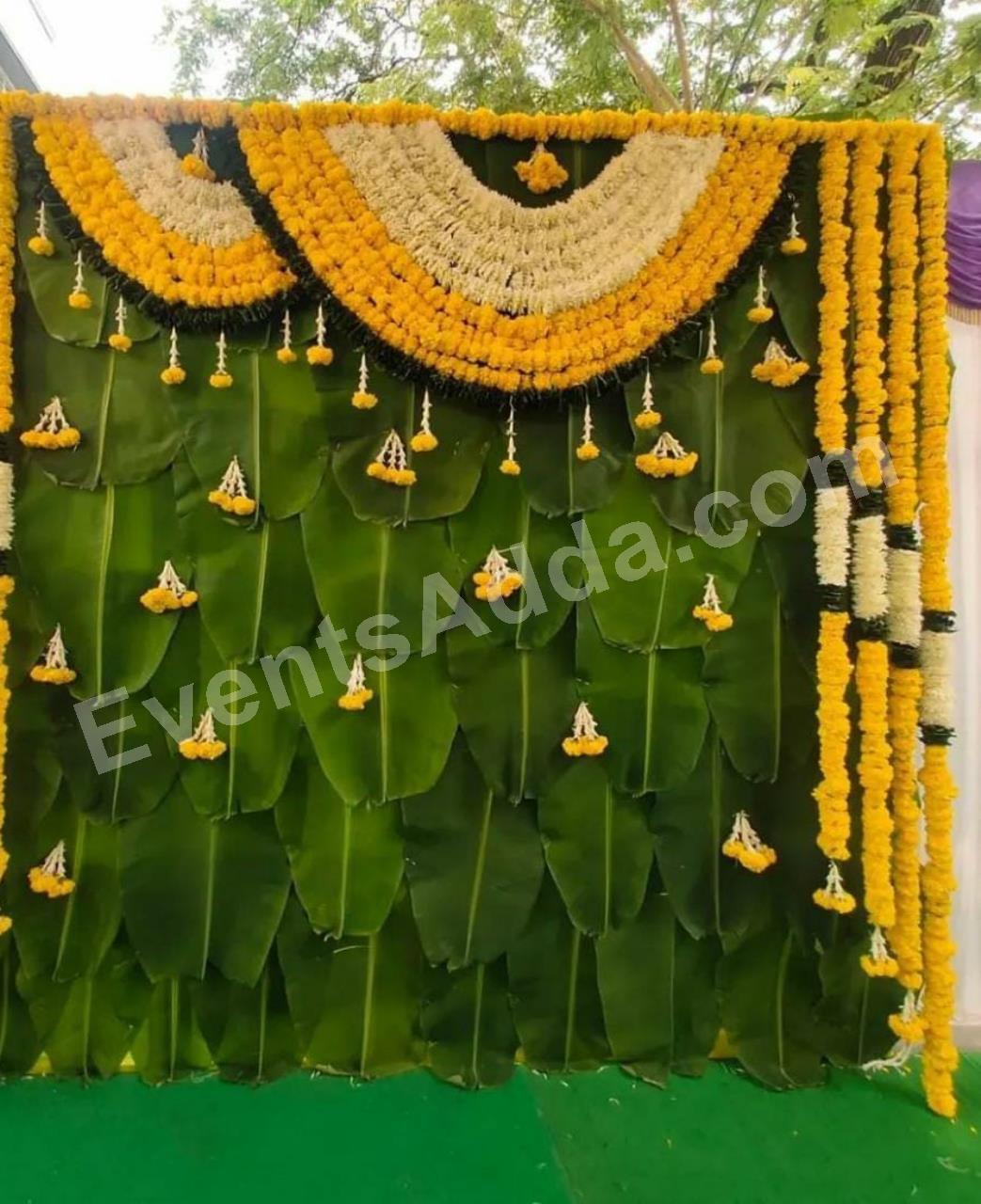 traditional-banana-leaf-marigold-floral-backdrop-decoration-4.jpg