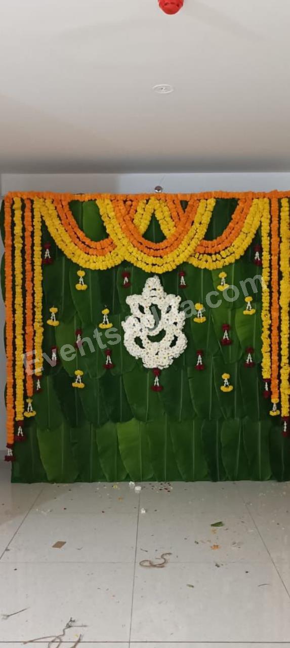 traditional-ganesh-banana-leaf-floral-backdrop-decoration-2.jpg