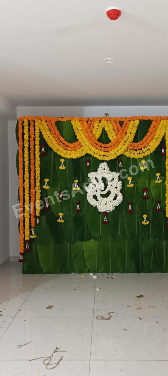 traditional-ganesh-banana-leaf-floral-backdrop-decoration-3.jpg