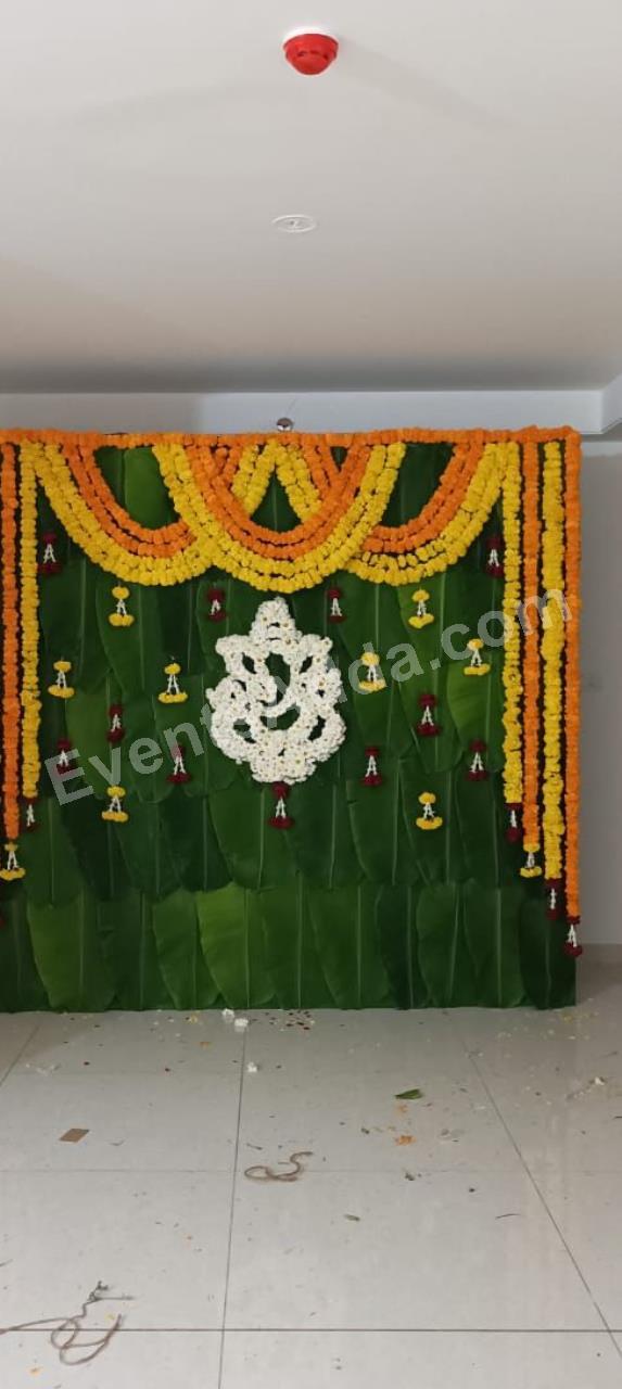 traditional-ganesh-banana-leaf-floral-backdrop-decoration-4.jpg