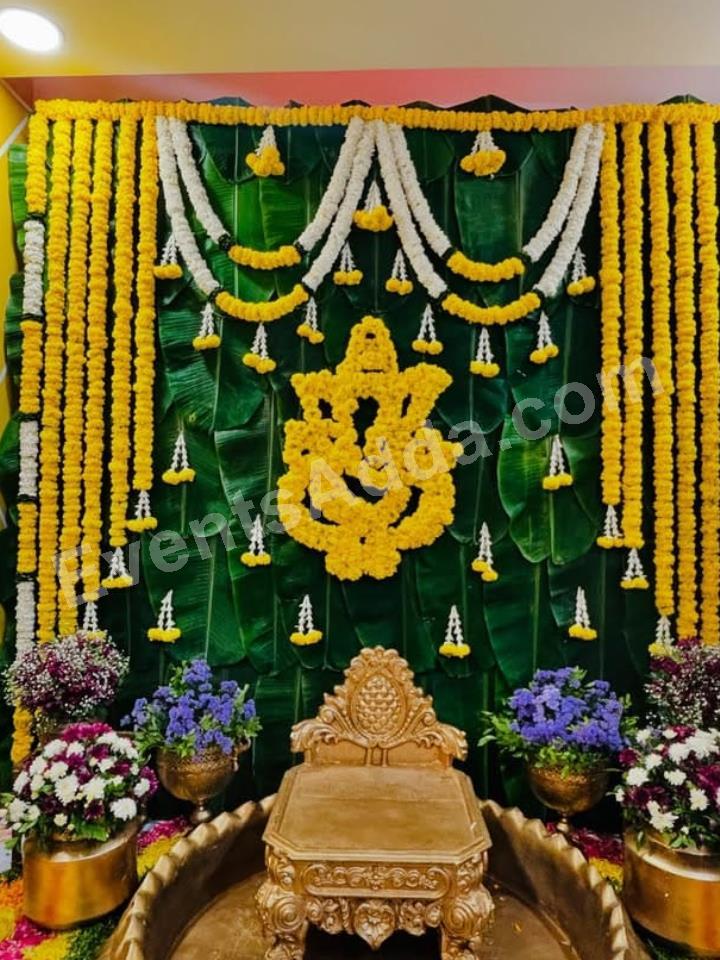 traditional-ganesha-floral-haldi-backdrop-decoration-2.jpg