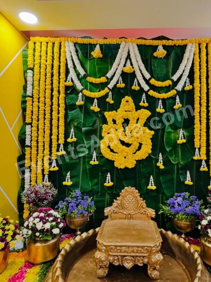 traditional-ganesha-floral-haldi-backdrop-decoration-3.jpg