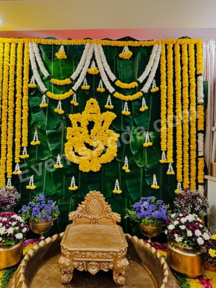 traditional-ganesha-floral-haldi-backdrop-decoration-4.jpg