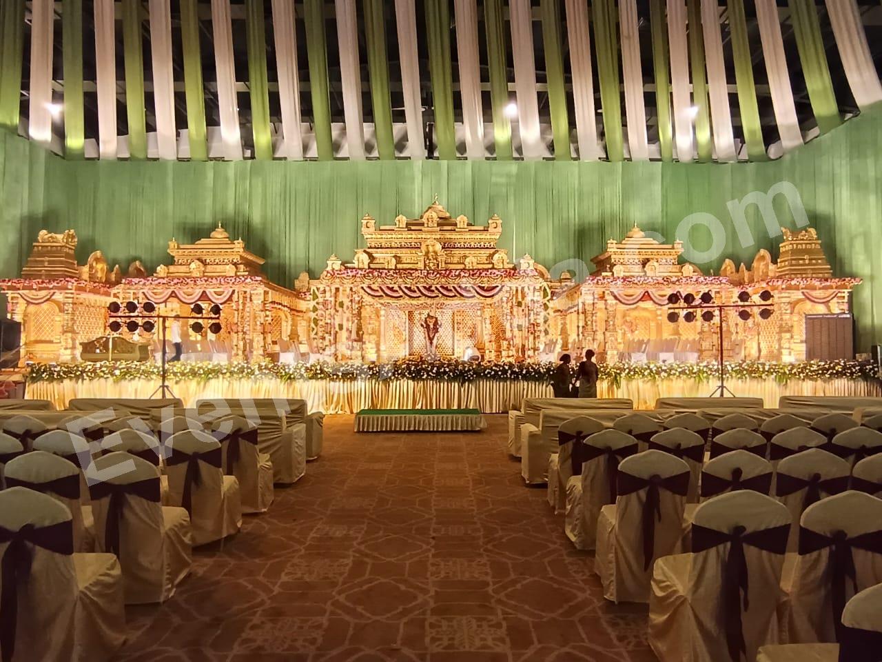 traditional-gold-temple-wedding-stage-with-green-draping Decoration in udaipur