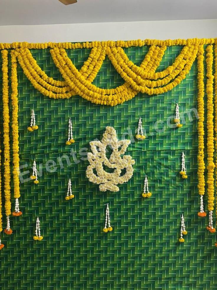 traditional-green-mat-floral-ganesha-backdrop-decoration-2.jpg