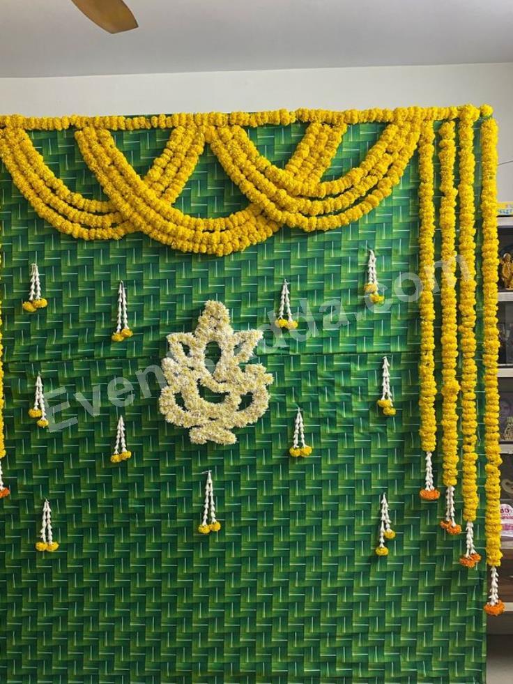 traditional-green-mat-floral-ganesha-backdrop-decoration-4.jpg