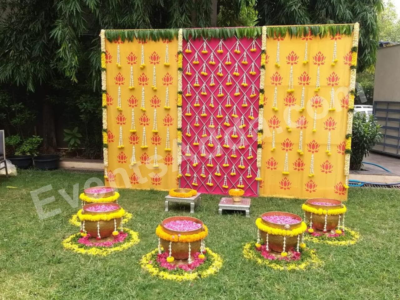 traditional-haldi-ceremony-floral-backdrop-decoration-2.jpg