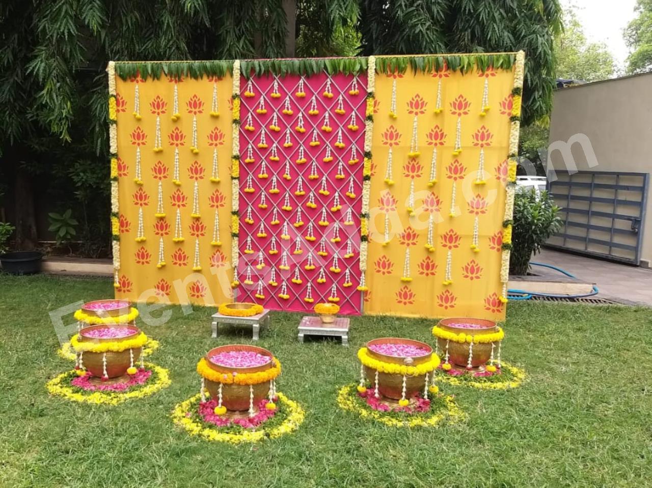 traditional-haldi-ceremony-floral-backdrop-decoration-4.jpg