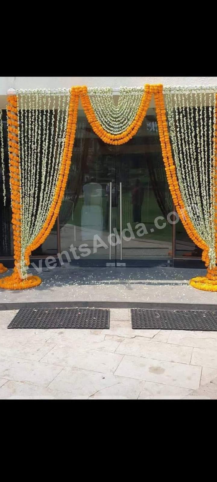 traditional-marigold-and-jasmine-entrance-decoration-2.jpg
