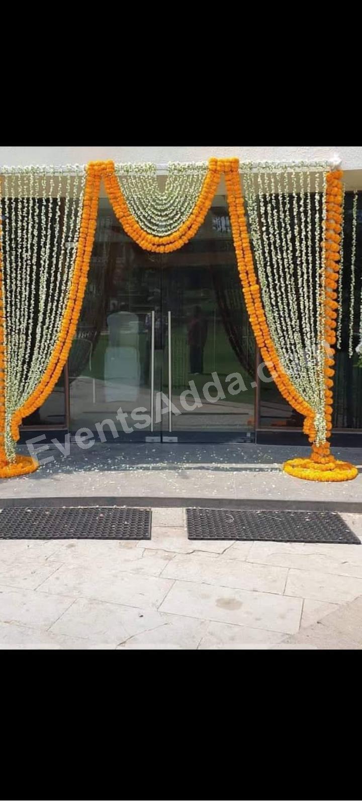 traditional-marigold-and-jasmine-entrance-decoration-4.jpg