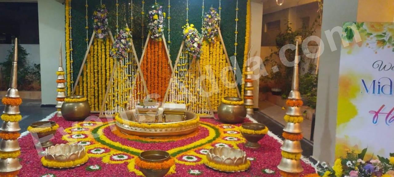 traditional-marigold-haldi-ceremony-floral-setup-4.jpg