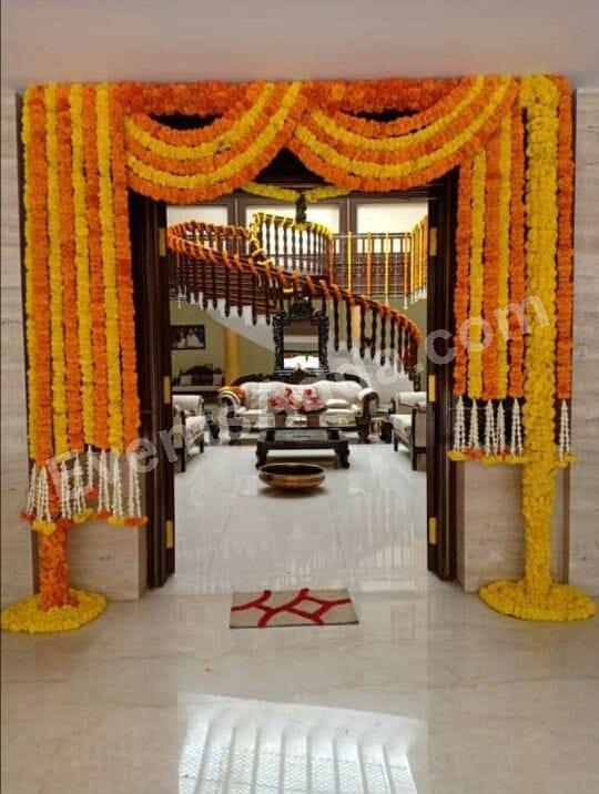 Traditional Orange and Yellow Marigold Doorway Decoration in Udaipur
