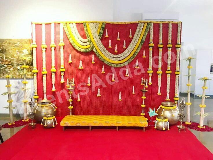 traditional-red-and-gold-haldi-ceremony-stage-decoration in Peddapalli