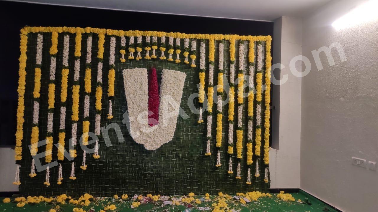 Traditional White and Yellow Flower Venkateswara Backdrop Decoration in Udaipur