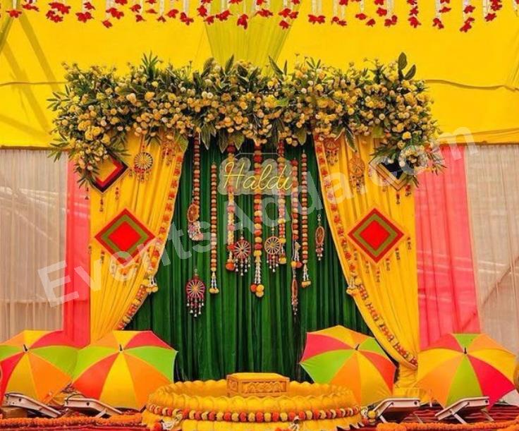 traditional-yellow--green-haldi-ceremony-decoration-2.jpg