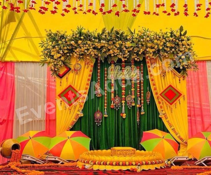 traditional-yellow--green-haldi-ceremony-decoration-3.jpg