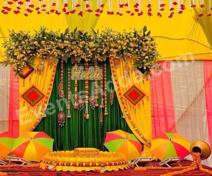 traditional-yellow--green-haldi-ceremony-decoration-4.jpg