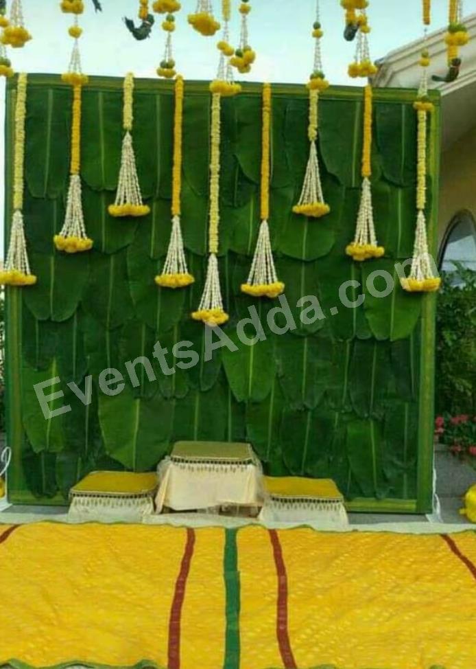 traditional-yellow-and-green-haldi-ceremony-decoration-2.jpg