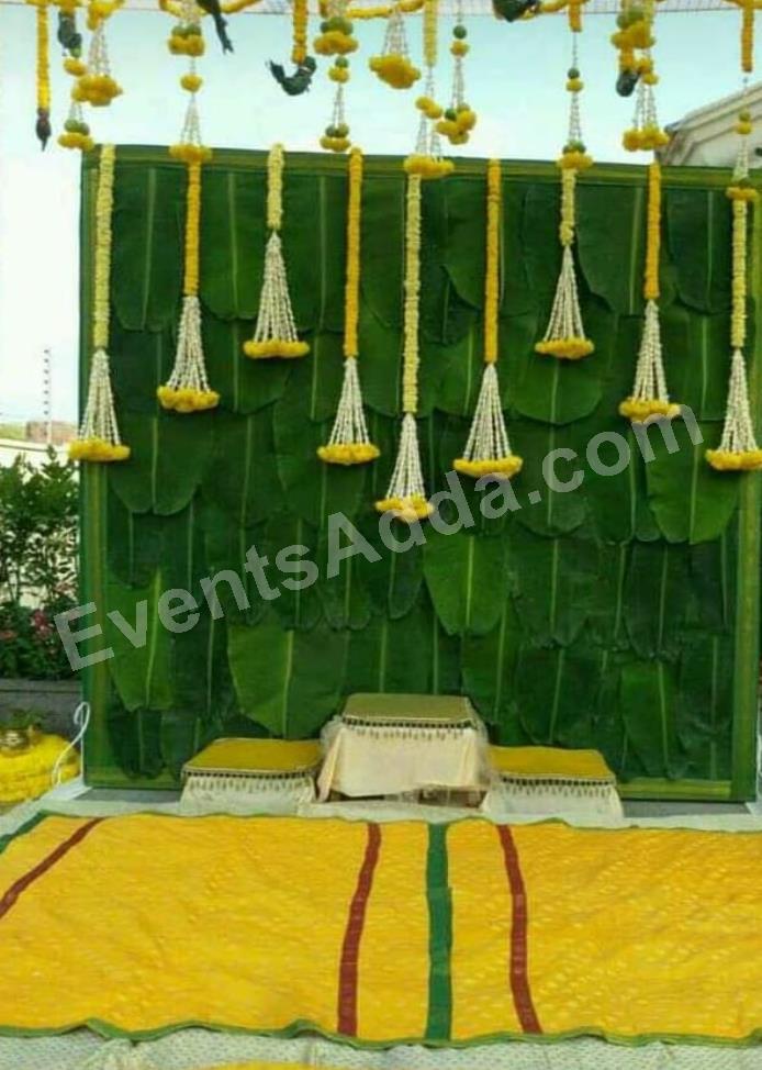 traditional-yellow-and-green-haldi-ceremony-decoration-3.jpg