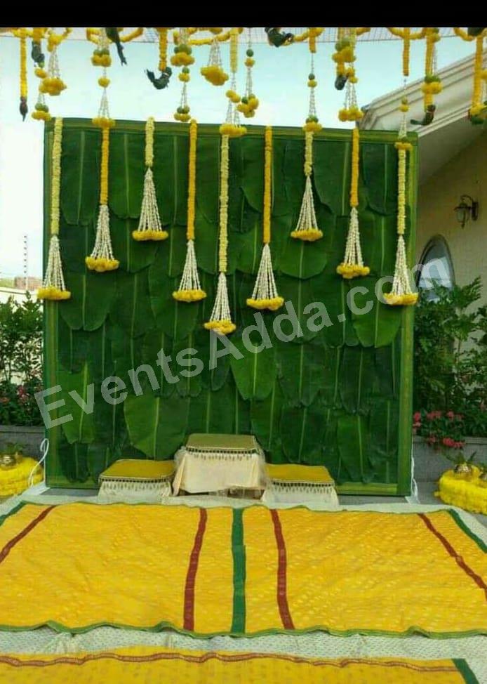 Traditional Yellow and Green Haldi Ceremony Decoration in Udaipur