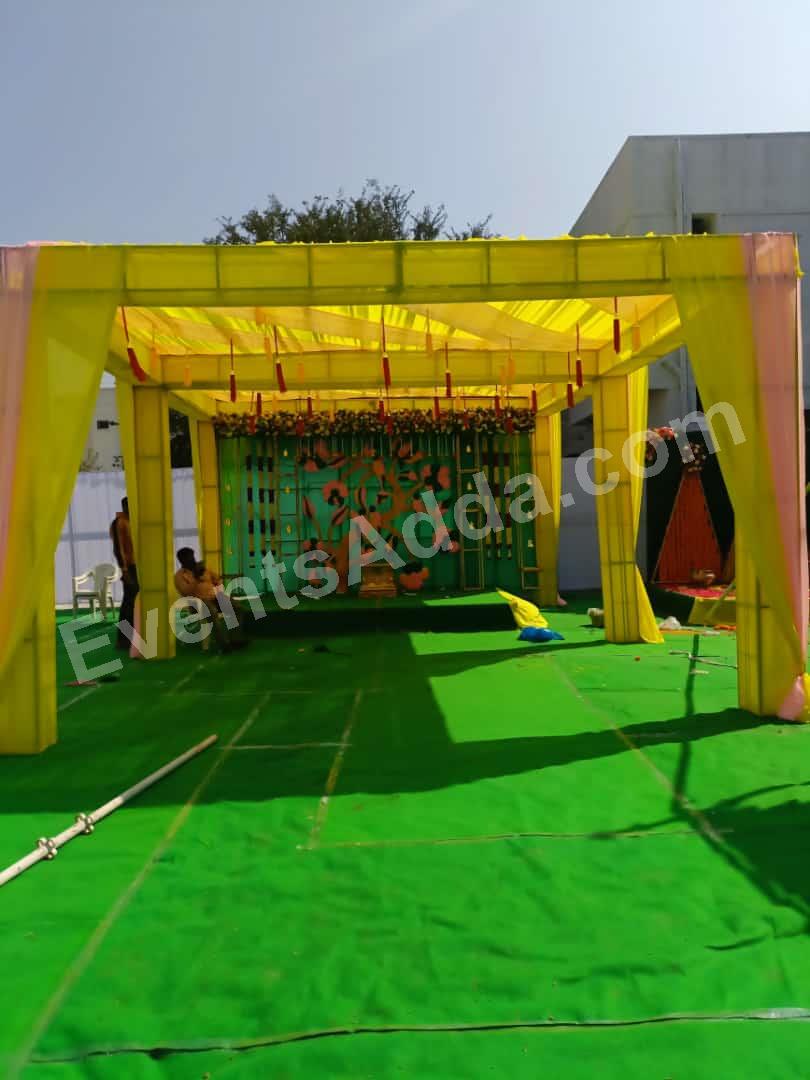 traditional-yellow-canopy-haldi-stage-decoration in Bangalore