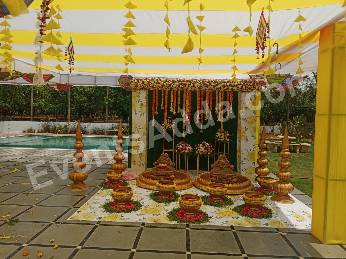 traditional-yellow-floral-haldi-canopy-decoration in Bangalore