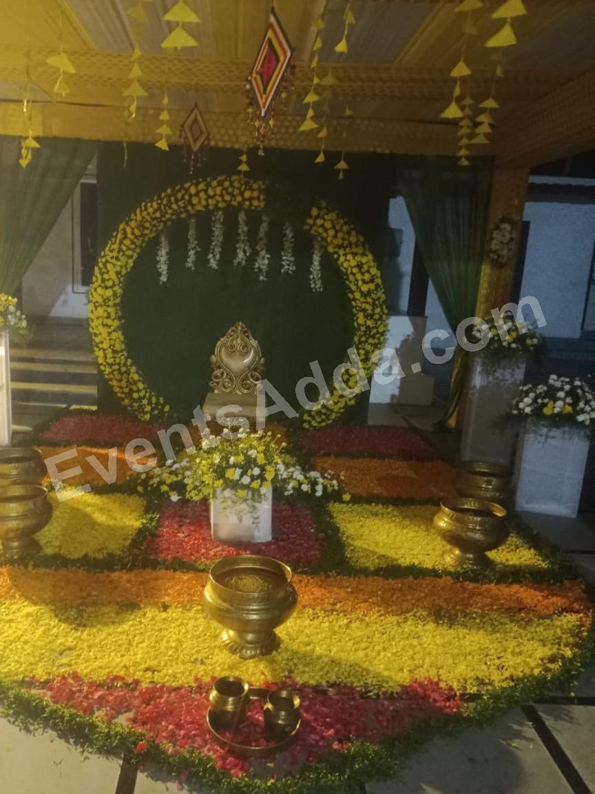 traditional-yellow-floral-haldi-ceremony-decoration-4.jpg