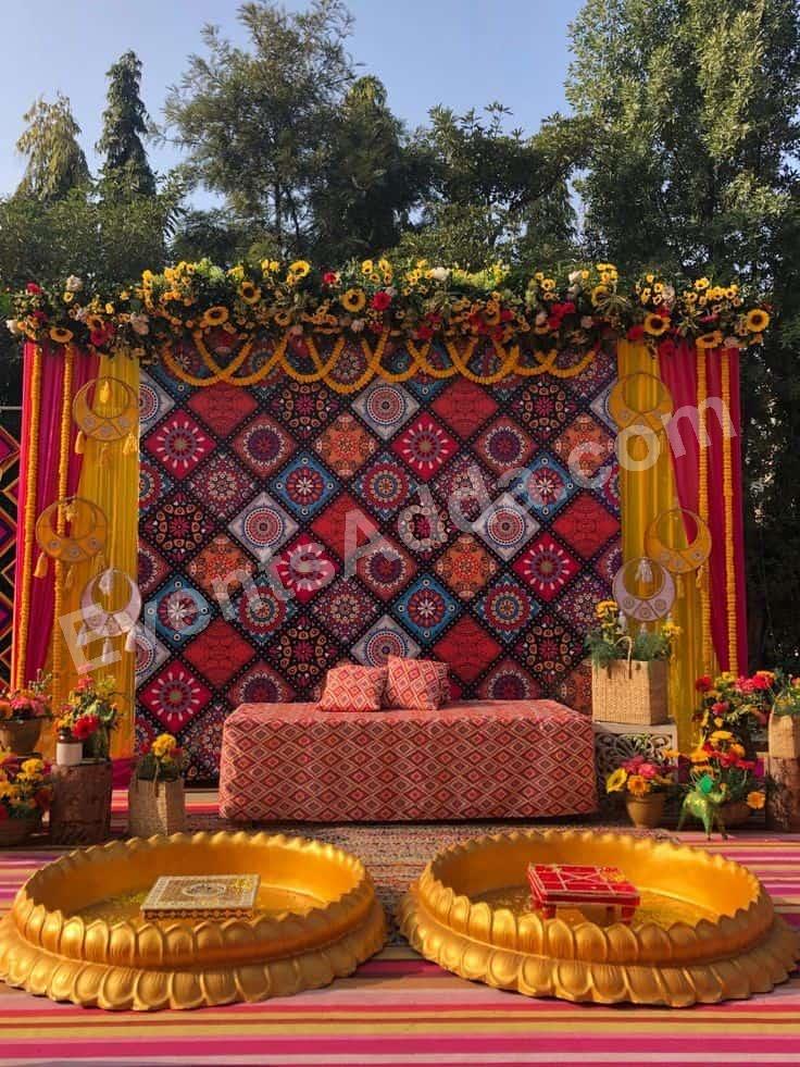 vibrant-boho-floral-haldi-stage-decoration in Bangalore