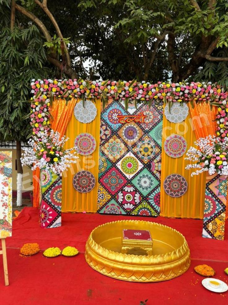 vibrant-floral-boho-haldi-ceremony-decoration-2.jpg