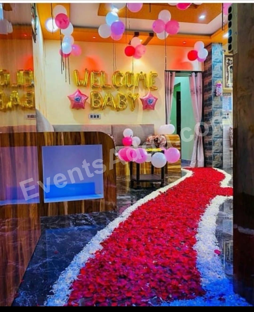 welcome-baby-home-balloon-decoration-with-rose-petal-pathway in Pune