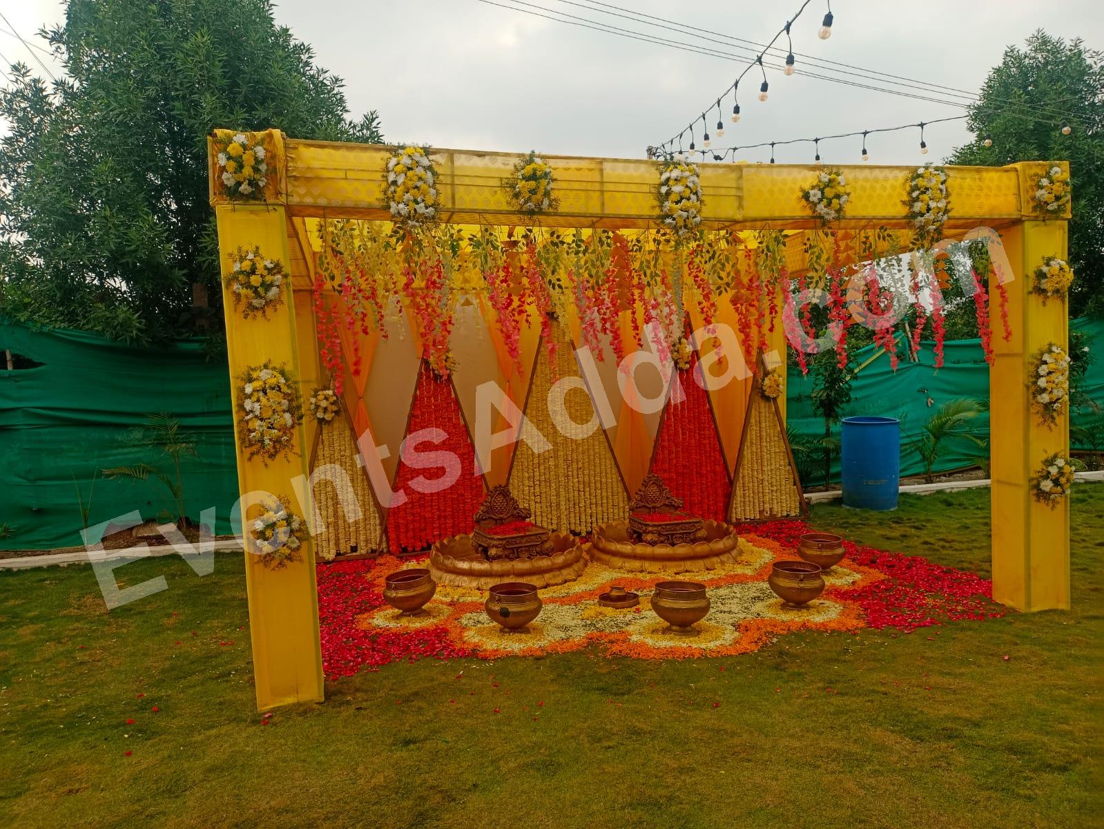yellow--orange-floral-haldi-canopy-decoration in Bangalore