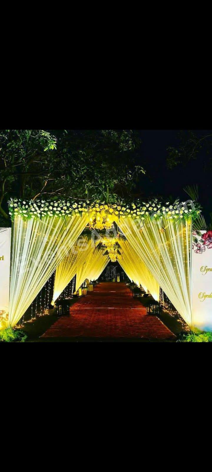 yellow-floral-draped-tunnel-entrance-decoration in Bangalore