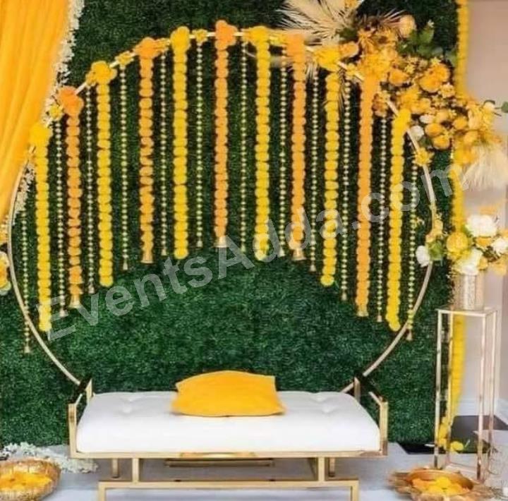 yellow-marigold-ring-haldi-ceremony-backdrop-decoration-4.jpg